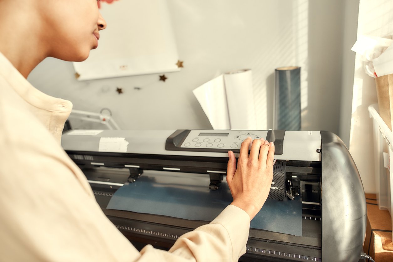 person using dtg printer